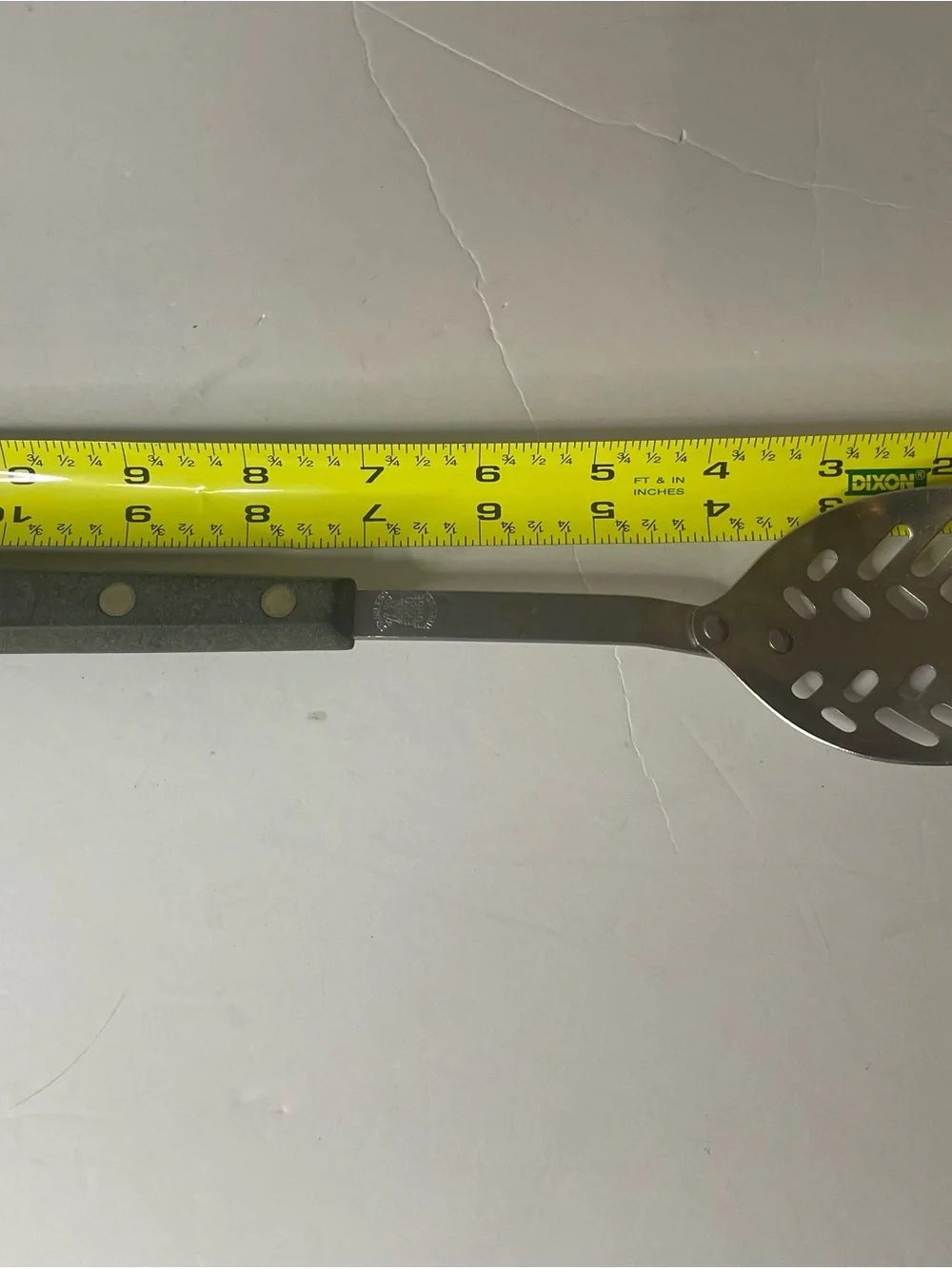 Vintage Ekco Stainless Steel Slotted Serving Spoon with Black Handle
